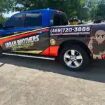Urban Brothers Appliance Repair branded service truck side view with contact number